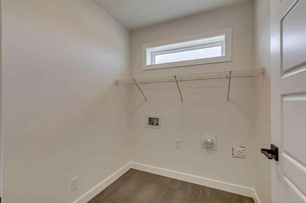 MLS® A2225028 - 51 Versant Way SW in Alpine Park Calgary, Residential