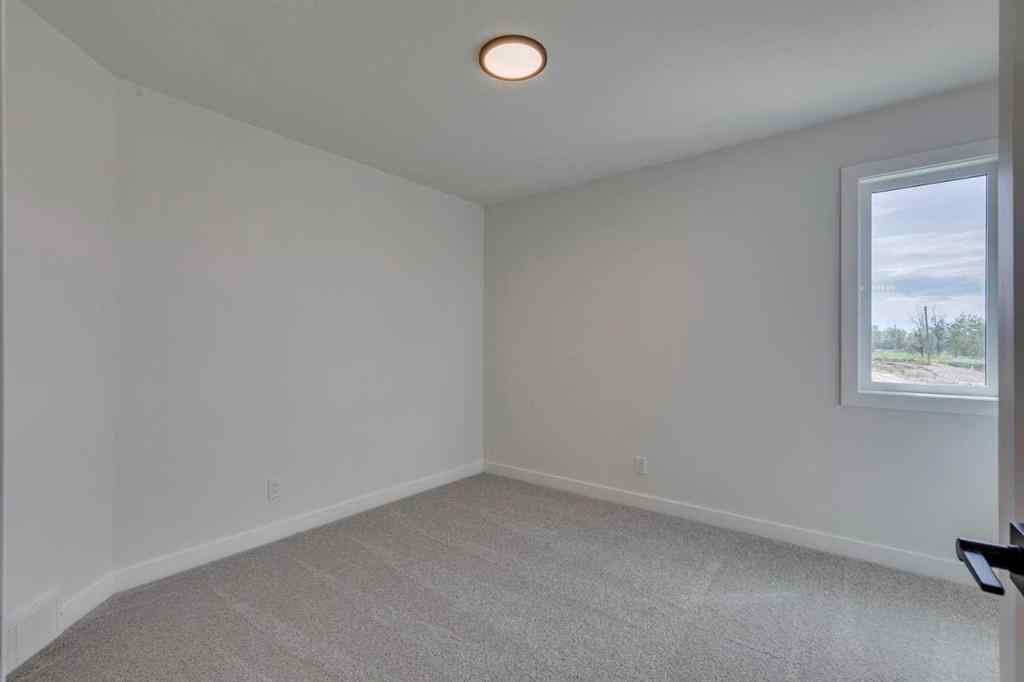 MLS® A2225028 - 51 Versant Way SW in Alpine Park Calgary, Residential