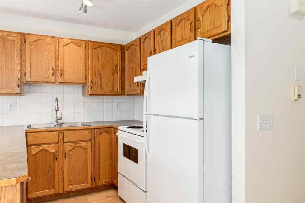 MLS® A2225106 - 227 Millview Green SW in Millrise Calgary, Residential