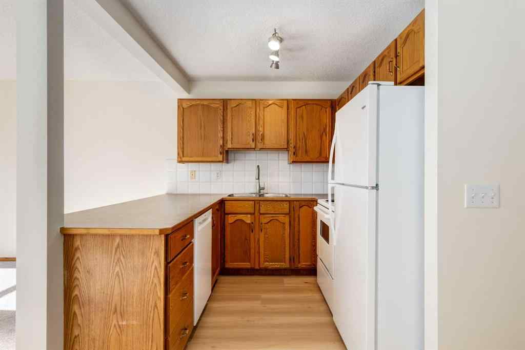 MLS® A2225106 - 227 Millview Green SW in Millrise Calgary, Residential