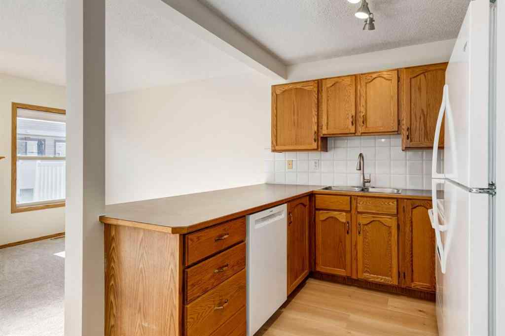 MLS® A2225106 - 227 Millview Green SW in Millrise Calgary, Residential