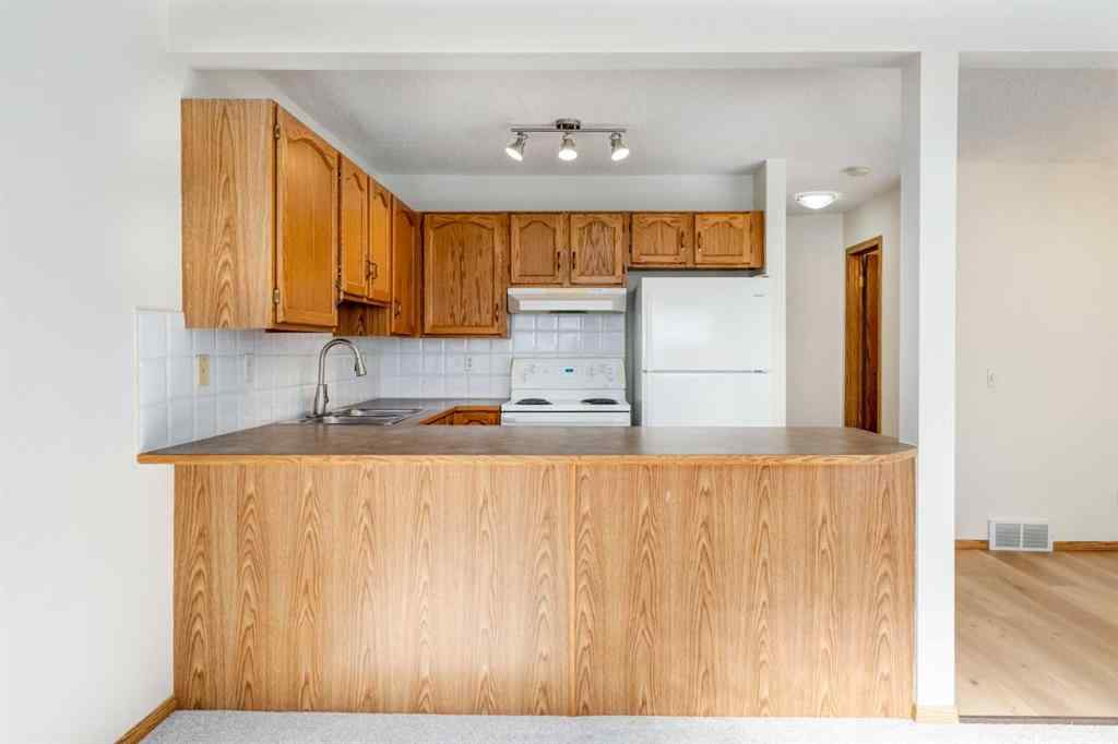 MLS® A2225106 - 227 Millview Green SW in Millrise Calgary, Residential