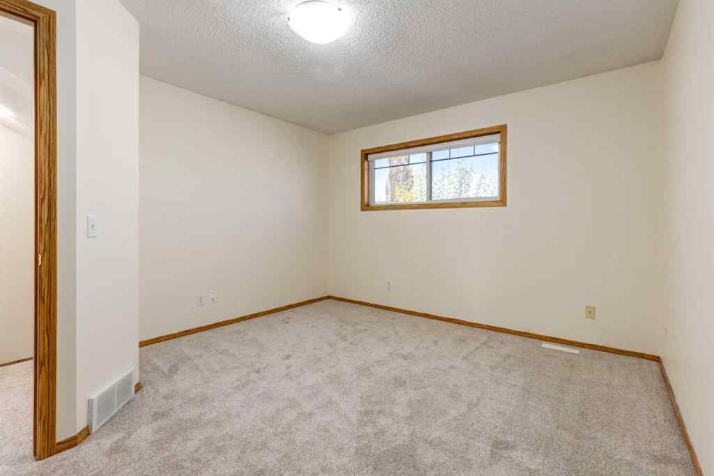 MLS® A2225106 - 227 Millview Green SW in Millrise Calgary, Residential