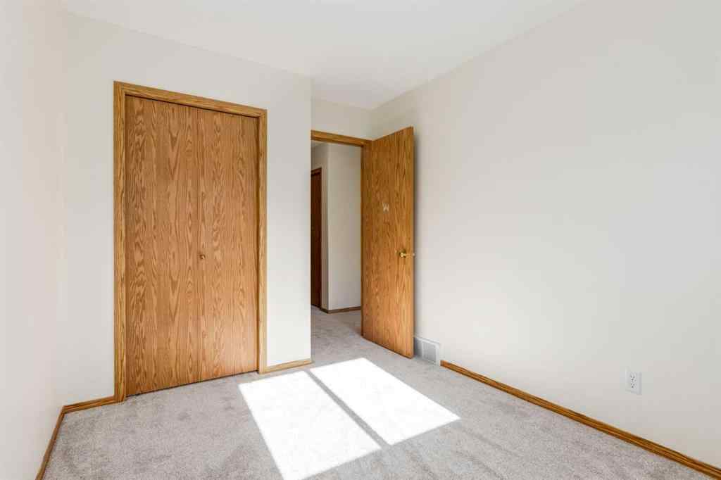 MLS® A2225106 - 227 Millview Green SW in Millrise Calgary, Residential