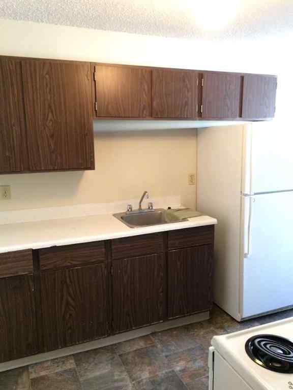 MLS® A2225168 - Unit #1-12 4607 73 Street NW in Bowness Calgary, Commercial