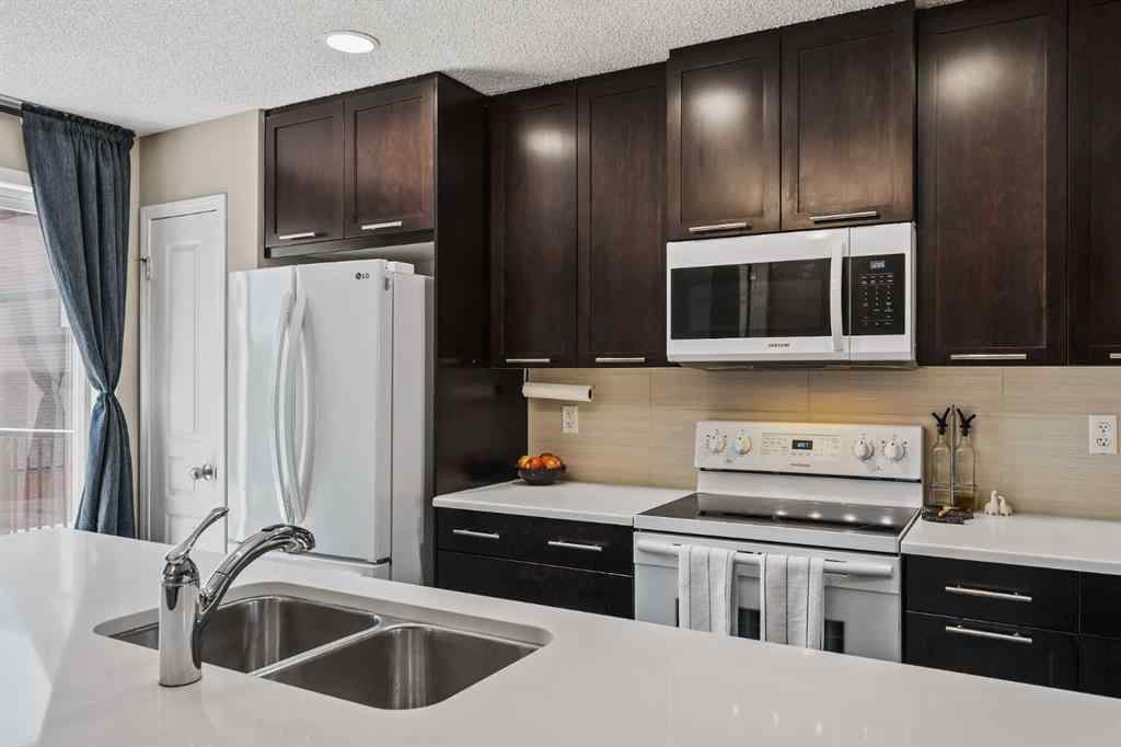 MLS® A2225519 - 103 New Brighton Villas SE in New Brighton Calgary, Residential