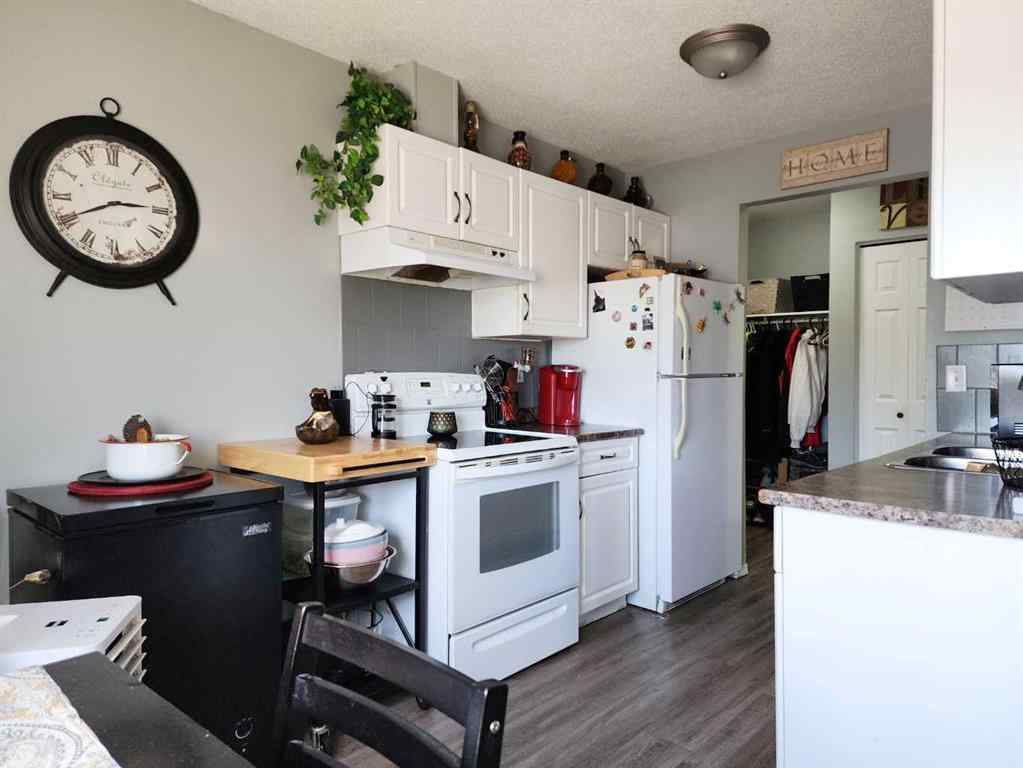 MLS® A2225588 - Unit #7 1739 St Edward Boulevard N in St Edwards Lethbridge, Residential