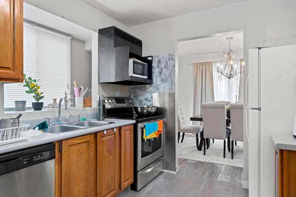 MLS® A2225893 - 7827 Hunterquay Road NW in Huntington Hills Calgary, Residential