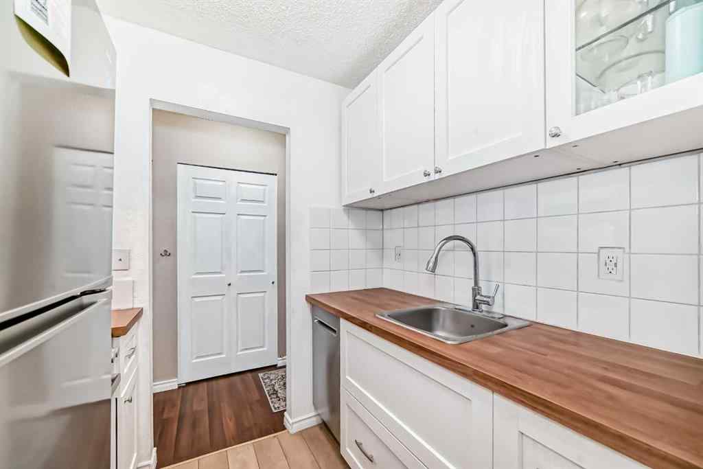 MLS® A2225968 - Unit #203 1113 37 Street SW in Rosscarrock Calgary, Residential