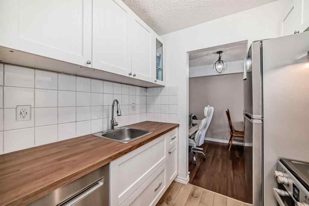 MLS® A2225968 - Unit #203 1113 37 Street SW in Rosscarrock Calgary, Residential