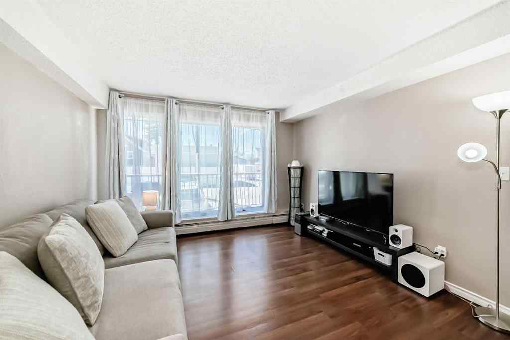 MLS® A2225968 - Unit #203 1113 37 Street SW in Rosscarrock Calgary, Residential