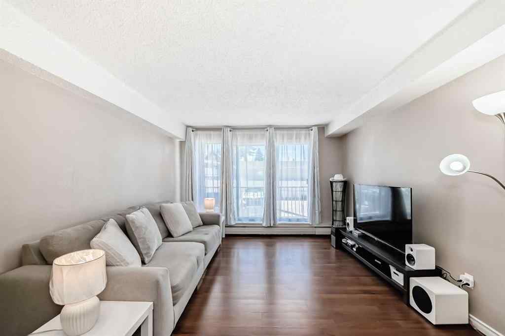 MLS® A2225968 - Unit #203 1113 37 Street SW in Rosscarrock Calgary, Residential