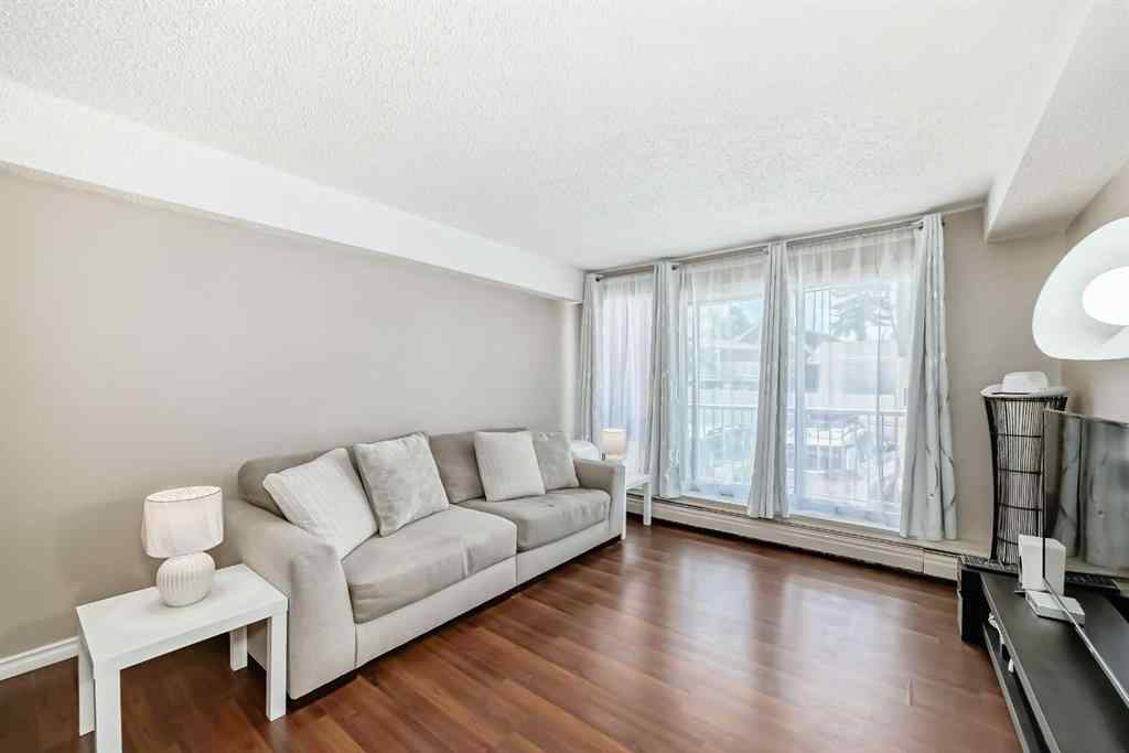 MLS® A2225968 - Unit #203 1113 37 Street SW in Rosscarrock Calgary, Residential