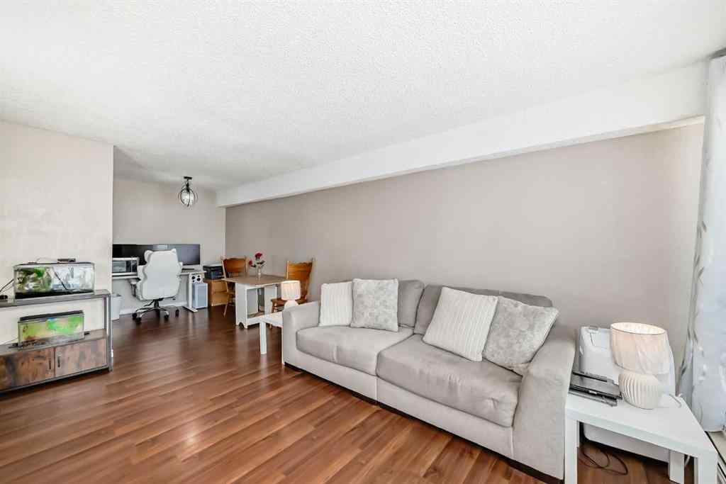 MLS® A2225968 - Unit #203 1113 37 Street SW in Rosscarrock Calgary, Residential