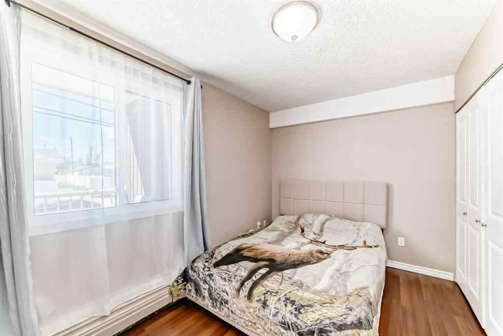 MLS® A2225968 - Unit #203 1113 37 Street SW in Rosscarrock Calgary, Residential