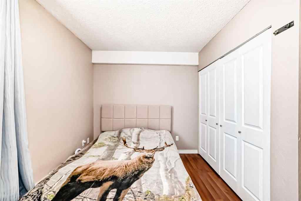 MLS® A2225968 - Unit #203 1113 37 Street SW in Rosscarrock Calgary, Residential