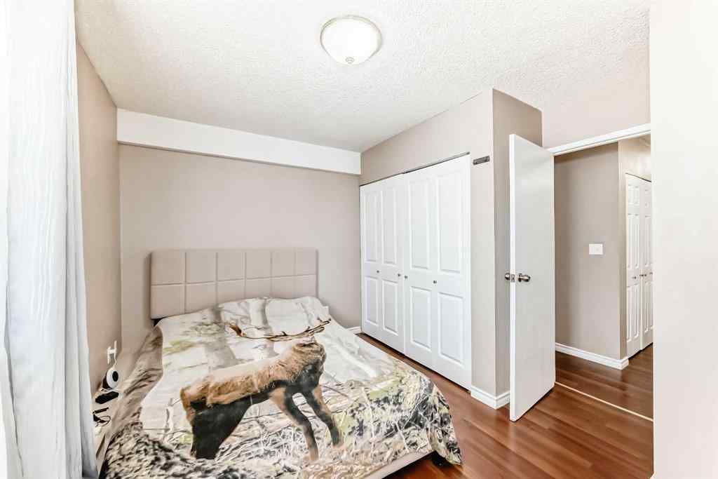 MLS® A2225968 - Unit #203 1113 37 Street SW in Rosscarrock Calgary, Residential