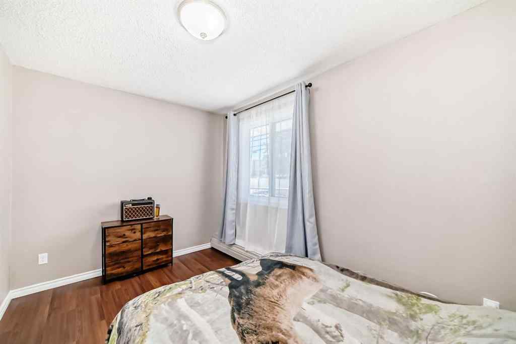 MLS® A2225968 - Unit #203 1113 37 Street SW in Rosscarrock Calgary, Residential