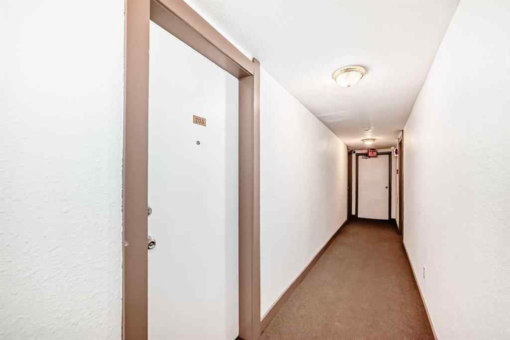MLS® A2225968 - Unit #203 1113 37 Street SW in Rosscarrock Calgary, Residential