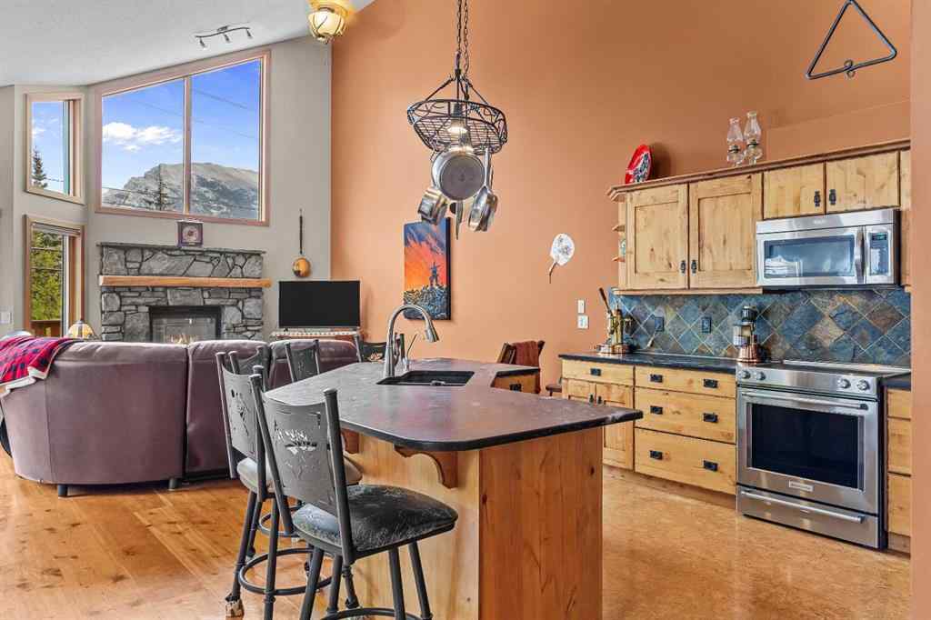 MLS® A2226018 - Unit #B 243 Three Sisters Drive  in Hospital Hill Canmore, Residential
