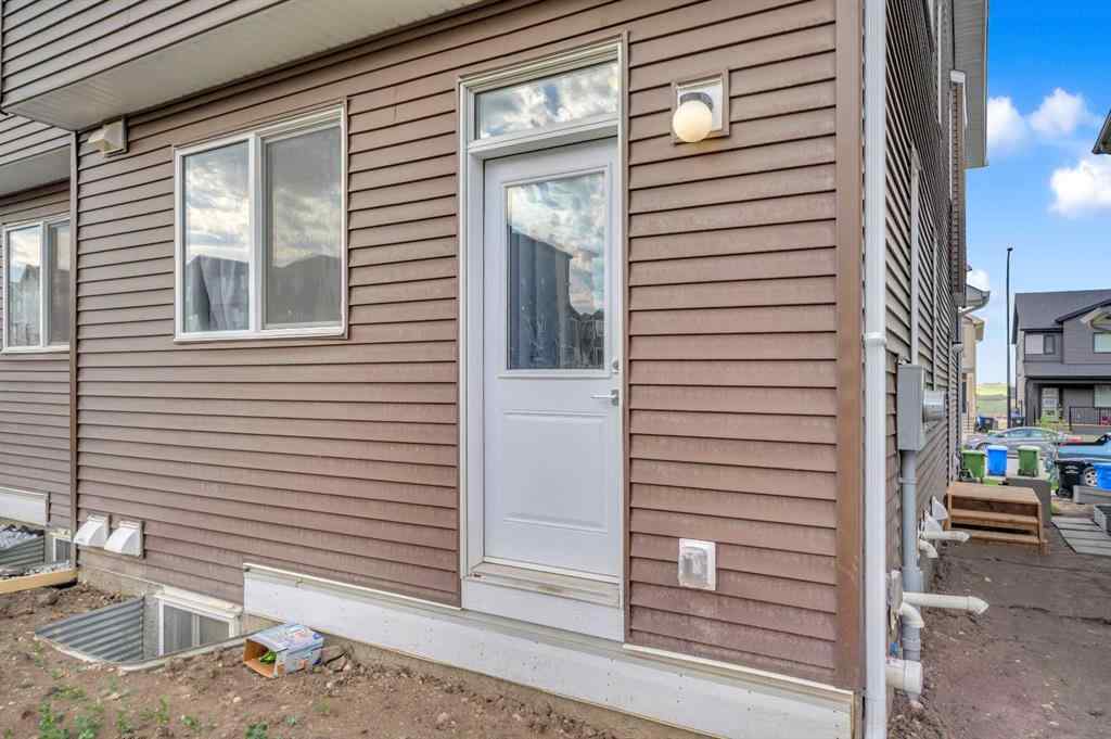 MLS® A2226092 - 487 Tekarra Drive NW in Glacier Ridge Calgary, Residential
