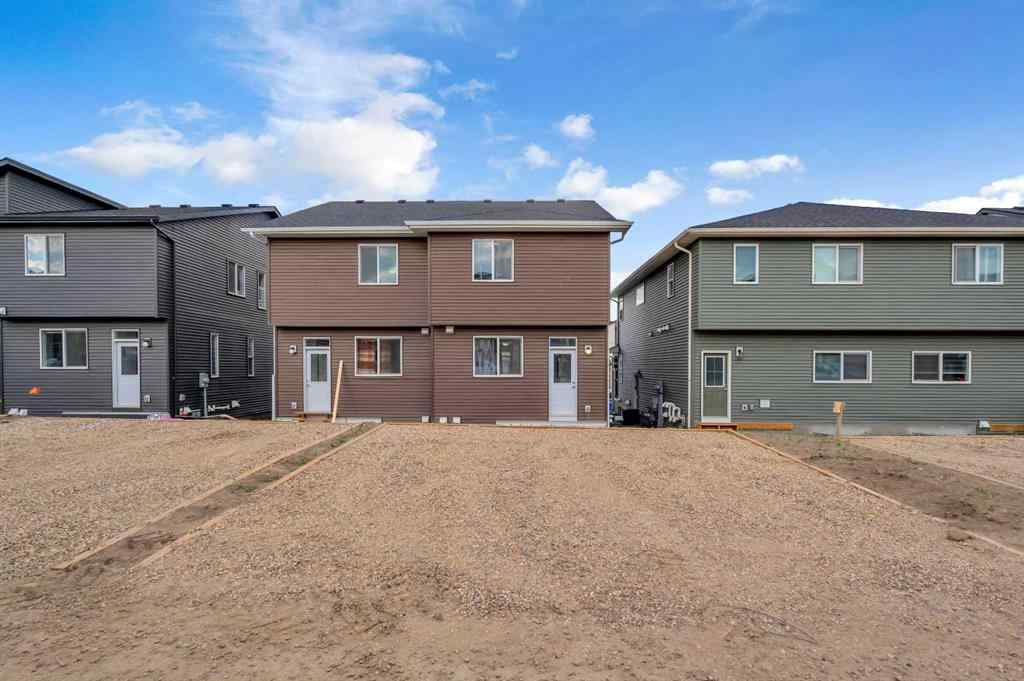 MLS® A2226092 - 487 Tekarra Drive NW in Glacier Ridge Calgary, Residential