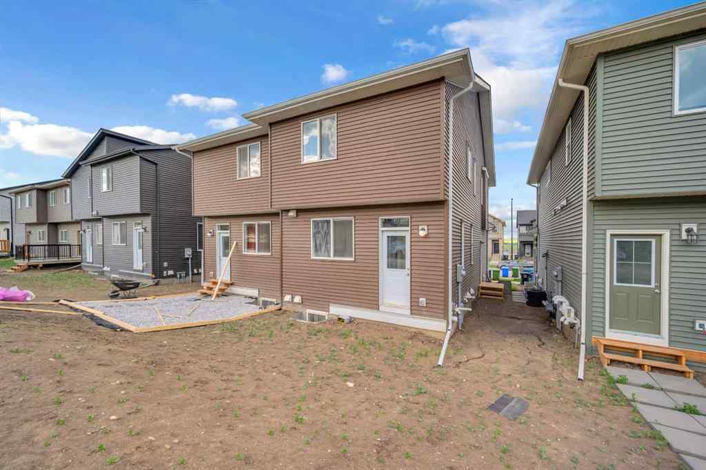 MLS® A2226092 - 487 Tekarra Drive NW in Glacier Ridge Calgary, Residential