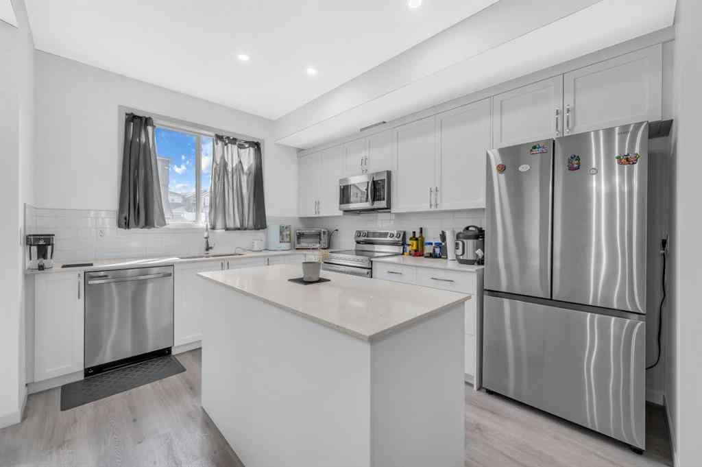 MLS® A2226092 - 487 Tekarra Drive NW in Glacier Ridge Calgary, Residential