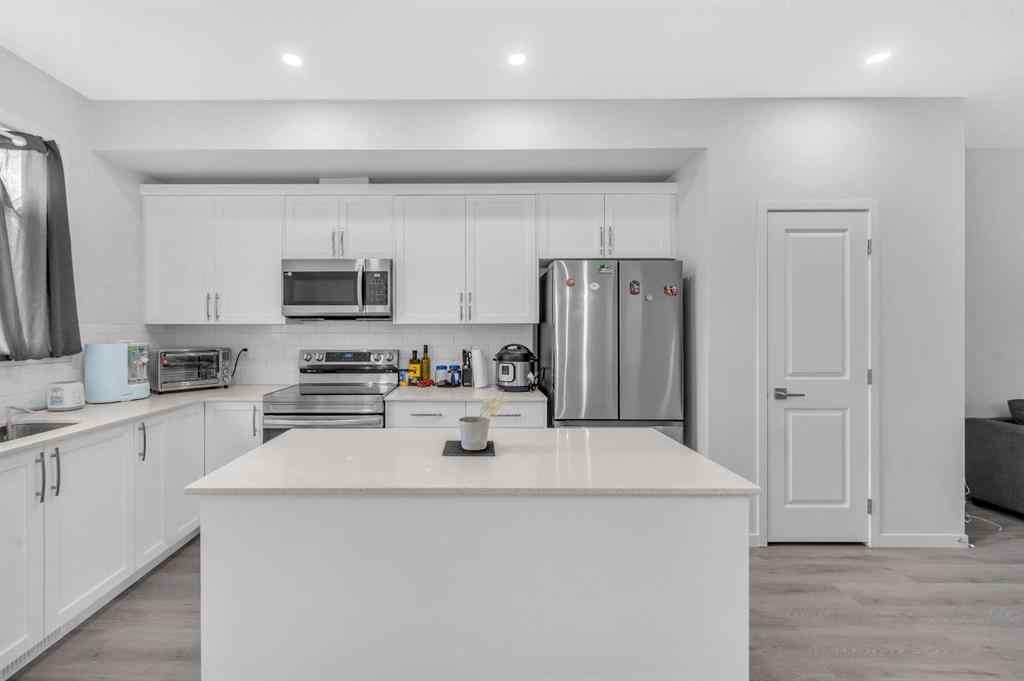 MLS® A2226092 - 487 Tekarra Drive NW in Glacier Ridge Calgary, Residential
