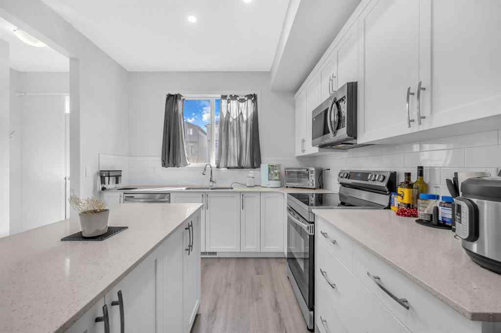 MLS® A2226092 - 487 Tekarra Drive NW in Glacier Ridge Calgary, Residential