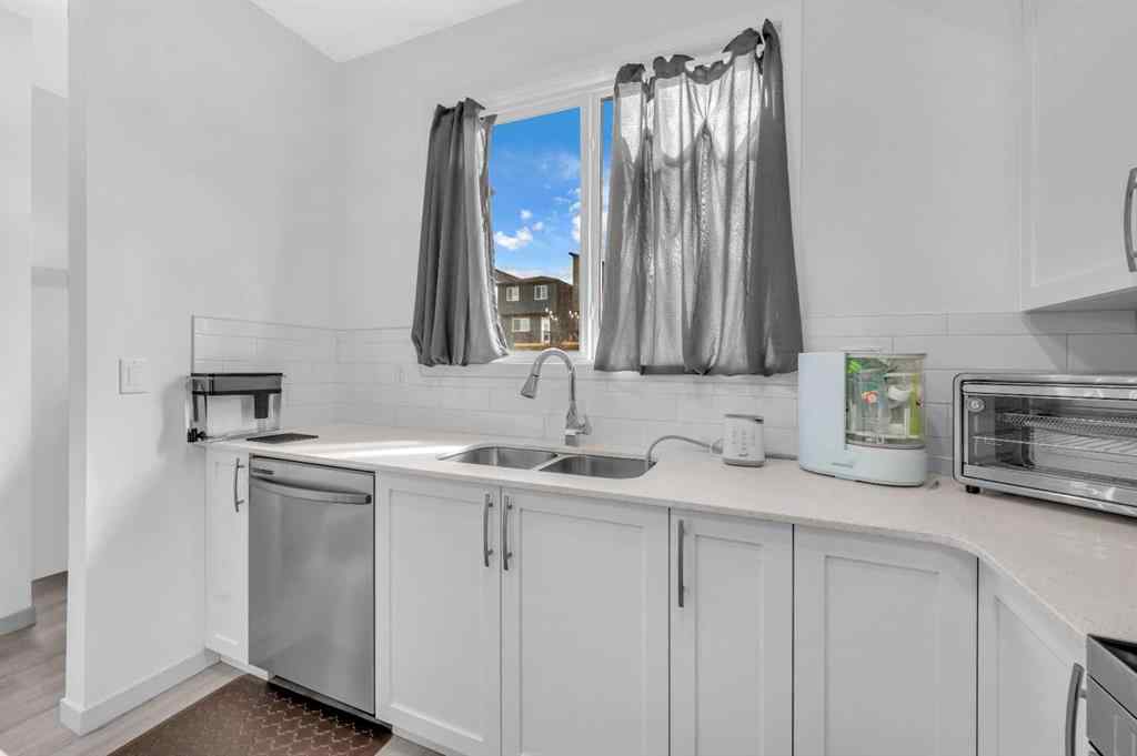 MLS® A2226092 - 487 Tekarra Drive NW in Glacier Ridge Calgary, Residential