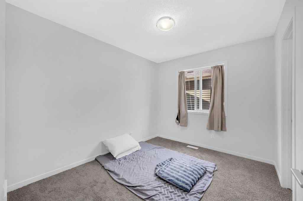 MLS® A2226092 - 487 Tekarra Drive NW in Glacier Ridge Calgary, Residential
