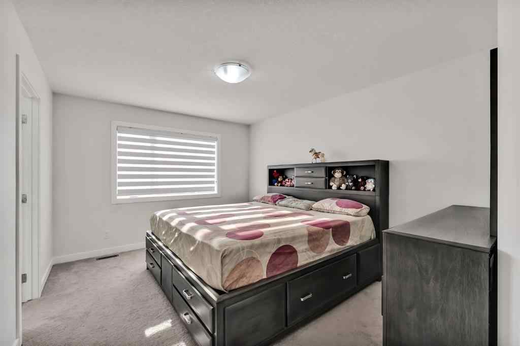 MLS® A2226208 - 649 Reynolds Crescent SW in Coopers Crossing Airdrie, Residential