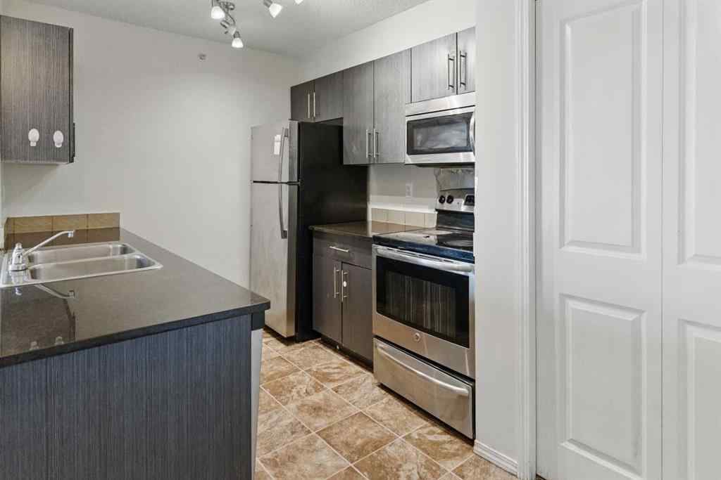 MLS® A2226240 - Unit #409 15 Saddlestone Way NE in Saddle Ridge Calgary, Residential