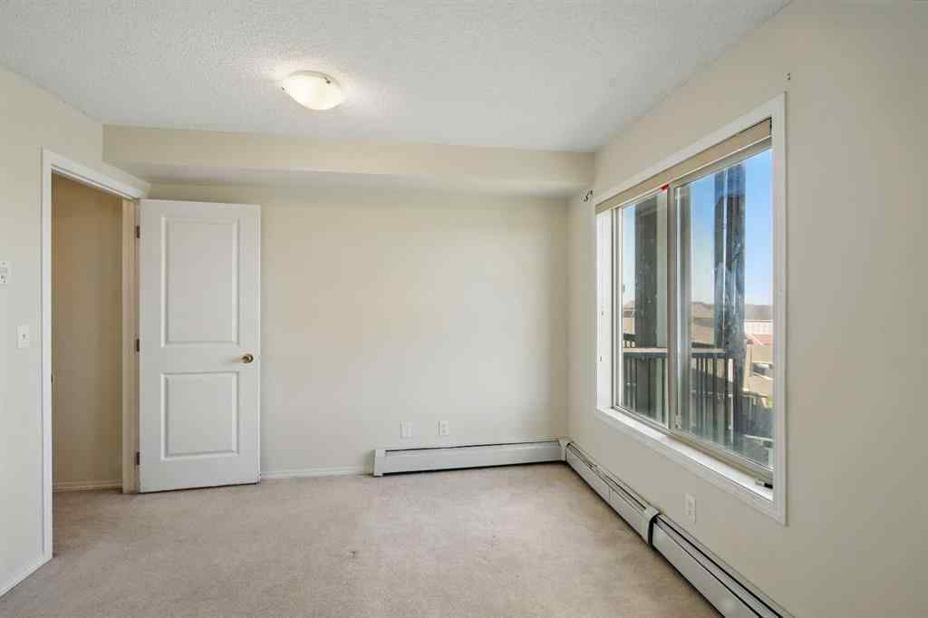 MLS® A2226240 - Unit #409 15 Saddlestone Way NE in Saddle Ridge Calgary, Residential