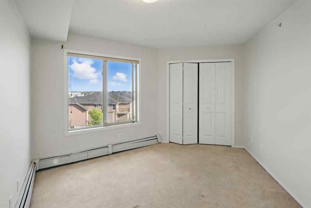 MLS® A2226240 - Unit #409 15 Saddlestone Way NE in Saddle Ridge Calgary, Residential