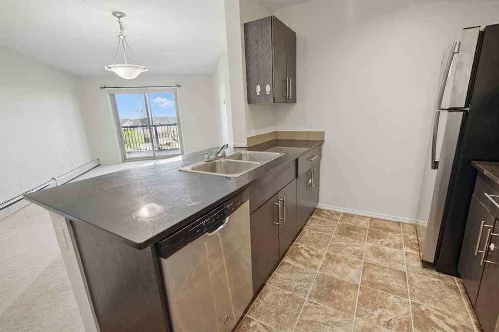 MLS® A2226240 - Unit #409 15 Saddlestone Way NE in Saddle Ridge Calgary, Residential
