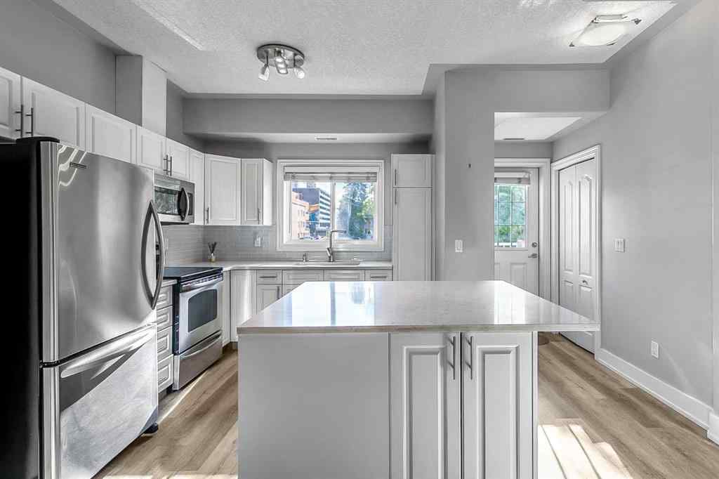 MLS® A2226249 - Unit #2 1720 11 Street SW in Lower Mount Royal Calgary, Residential