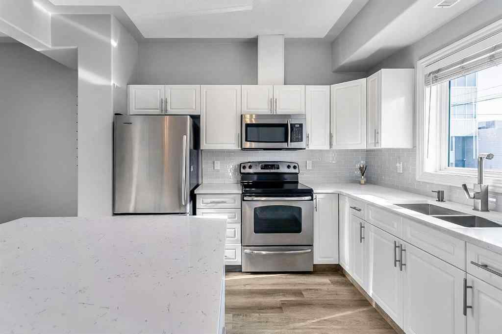 MLS® A2226249 - Unit #2 1720 11 Street SW in Lower Mount Royal Calgary, Residential