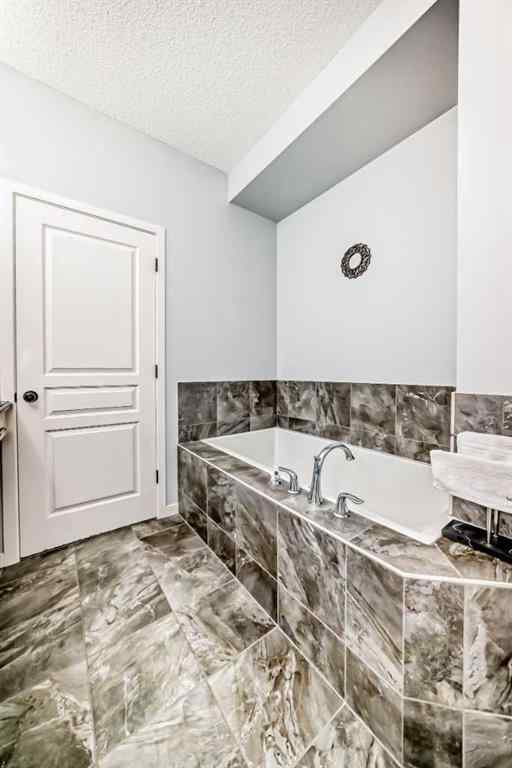 MLS® A2226275 - 2122 Brightoncrest Common SE in New Brighton Calgary, Residential