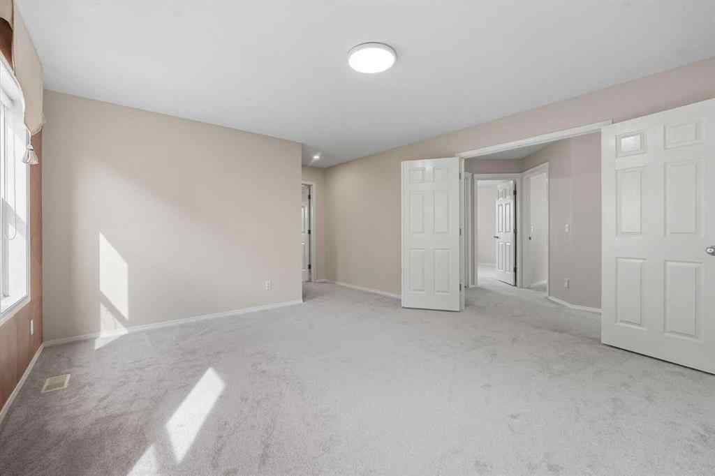 MLS® A2226308 - 14 Rockborough Park NW in Rocky Ridge Calgary, Residential