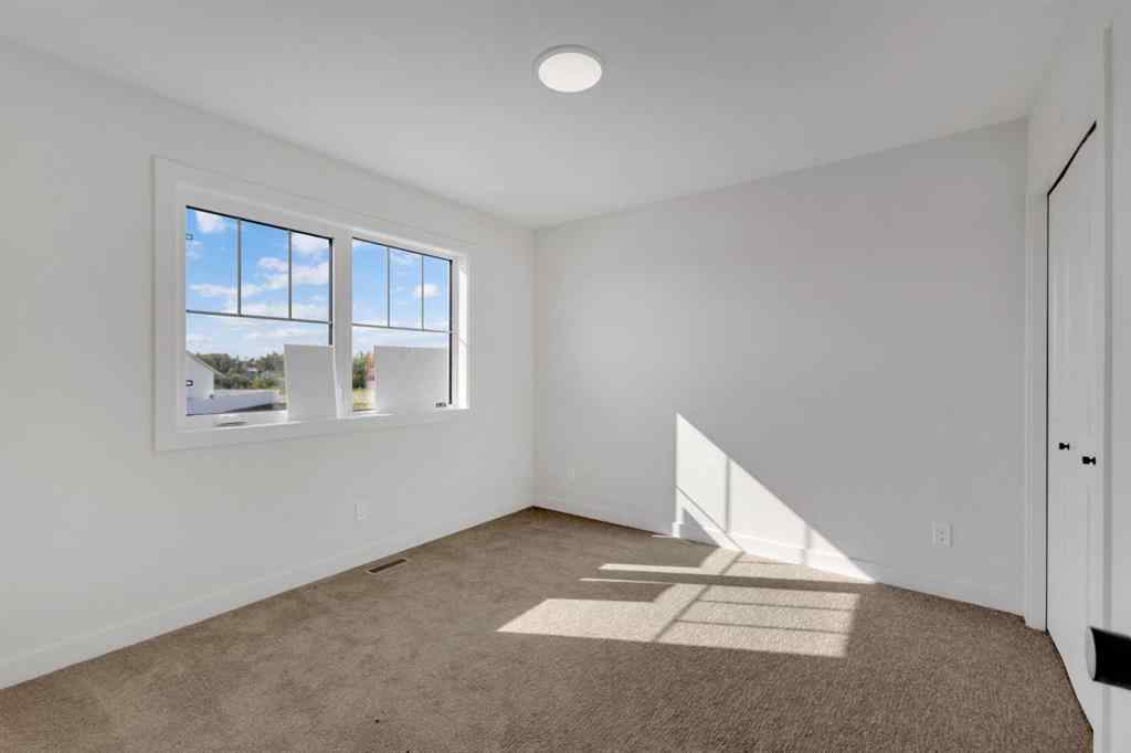 MLS® A2226332 - 115 Hampton Crescent  in Hampton Pointe Sylvan Lake, Residential