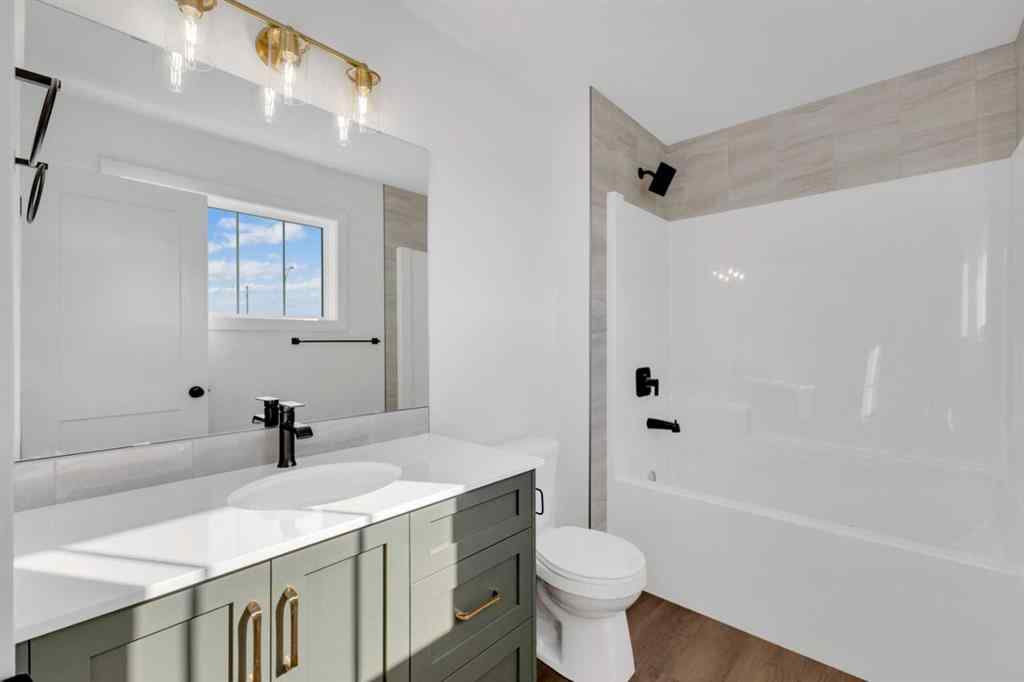 MLS® A2226332 - 115 Hampton Crescent  in Hampton Pointe Sylvan Lake, Residential