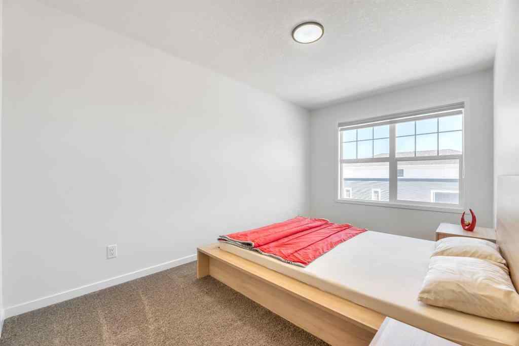 MLS® A2226467 - 31 Creekside Grove SW in Pine Creek Calgary, Residential