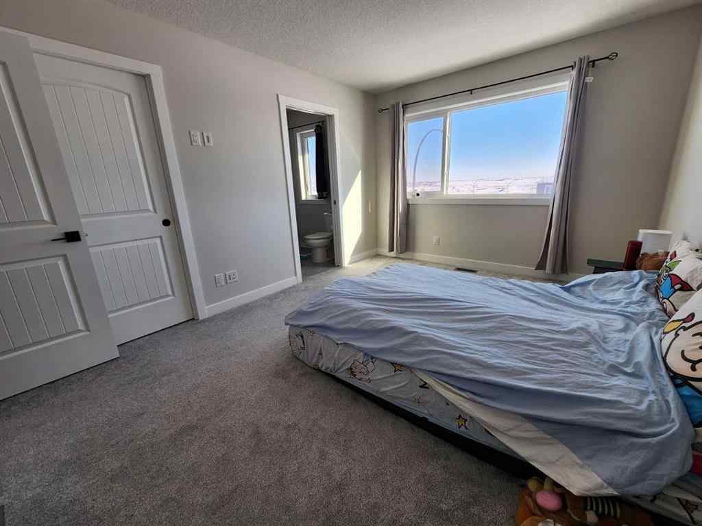 MLS® A2226472 - 99 Edith Passage NW in Glacier Ridge Calgary, Residential