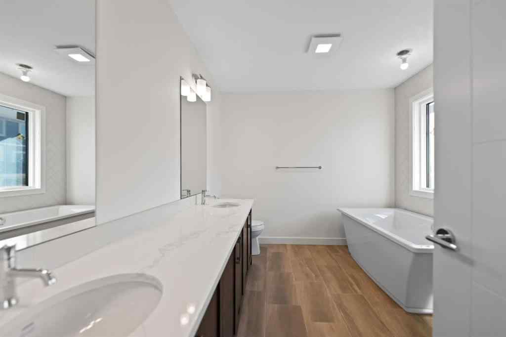 MLS® A2226717 - 648 South Point Heath SW in South Point Airdrie, Residential
