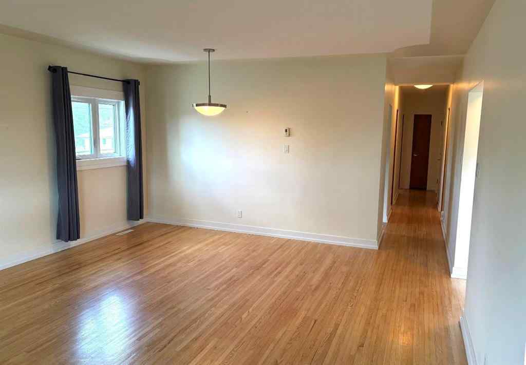 MLS® A2226753 - Unit #1-6 2208 20 Avenue NW in Banff Trail Calgary, Multi-Family