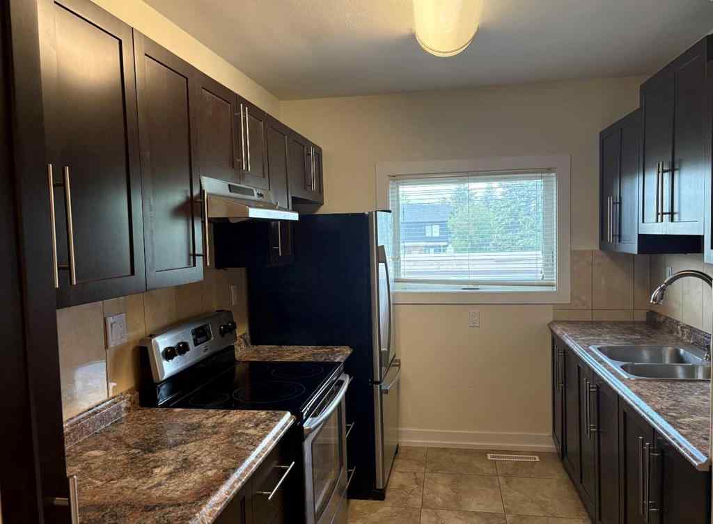MLS® A2226753 - Unit #1-6 2208 20 Avenue NW in Banff Trail Calgary, Multi-Family