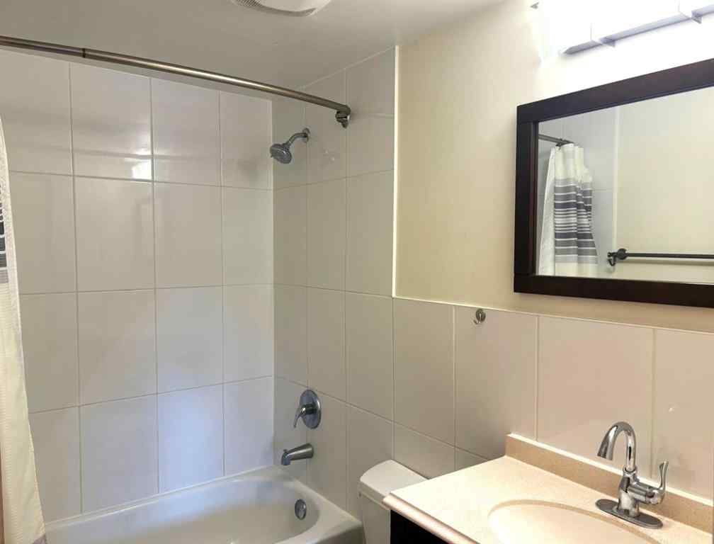 MLS® A2226753 - Unit #1-6 2208 20 Avenue NW in Banff Trail Calgary, Multi-Family