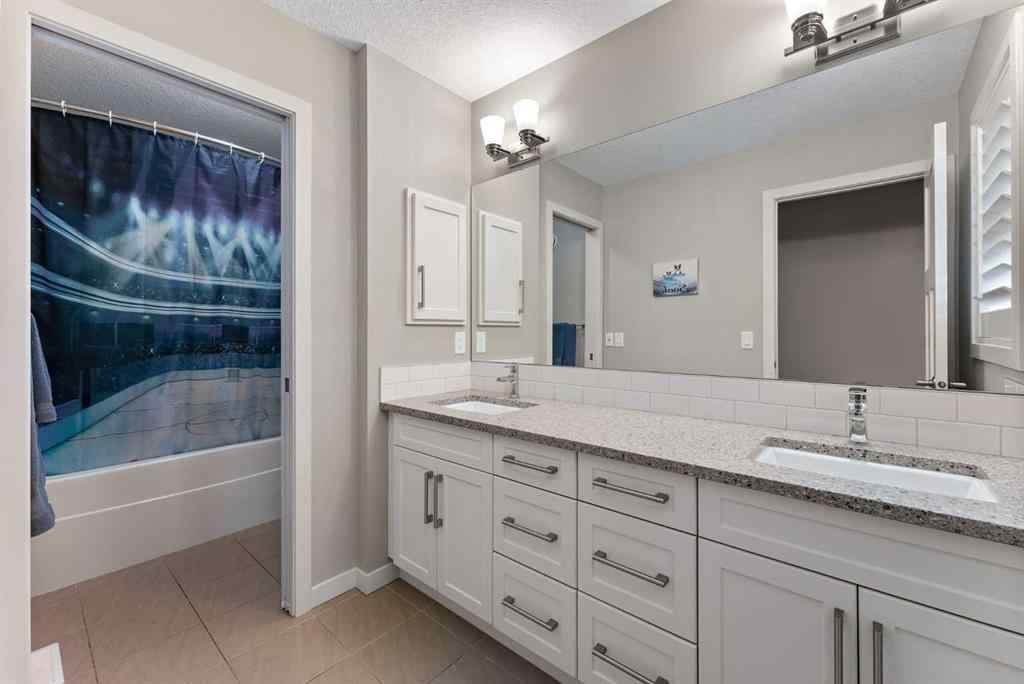 MLS® A2226843 - 220 Auburn Meadows Crescent SE in Auburn Bay Calgary, Residential